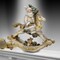 Contemporary Home Living 11.5" Beige and Gold Santa Rocking Horse Christmas Figurine
